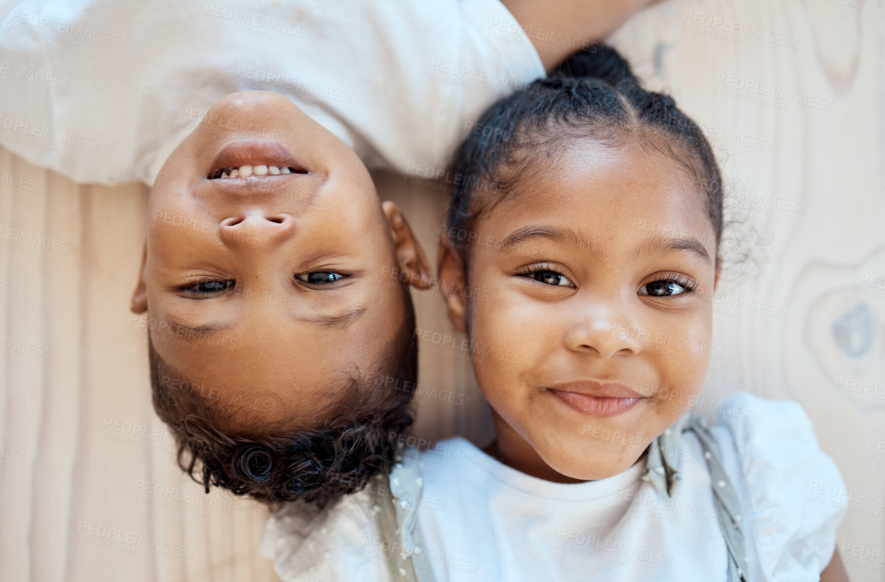 Buy stock photo Family friends, smile and children portrait of siblings with happiness, bonding and love at home. Faces of happy kids together above view of brother and sister care and young friendship in house 