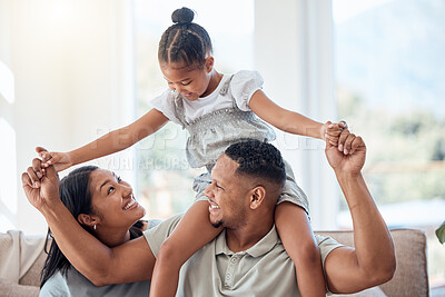 Buy stock photo Family, love and children with a mother, father and daughter bonding or playing on a sofa in the living room of their home. Kids, happy and smile with a man, woman and girl spending time together
