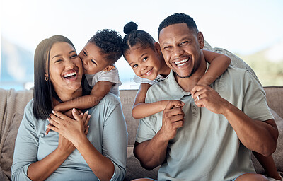 Buy stock photo Happy family, mother and father with children in a portrait in a sofa bonding hugging and laughing together. Mom, dad and fun Mexican kids playing, kissing parents and enjoying quality time in Mexico