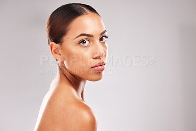 Buy stock photo Skincare, body and serious woman beauty portrait for natural cosmetic marketing with confident and assertive face. Health, wellness and glowing skin advertising model with gray studio mockup.

