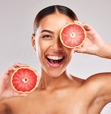 Buy stock photo Grapefruit, woman skincare and beauty, vitamin c and wellness, healthy facial aesthetics and natural cosmetics of dermatology on studio background. Portrait happy model, body nutrition and detox diet