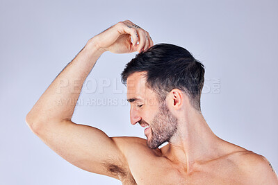 Buy stock photo Beauty, armpit and fresh with a man model in studio on a gray background for hygiene or body care. Skincare, health and underarm with a handsome young male posing to promote wellness or bodycare