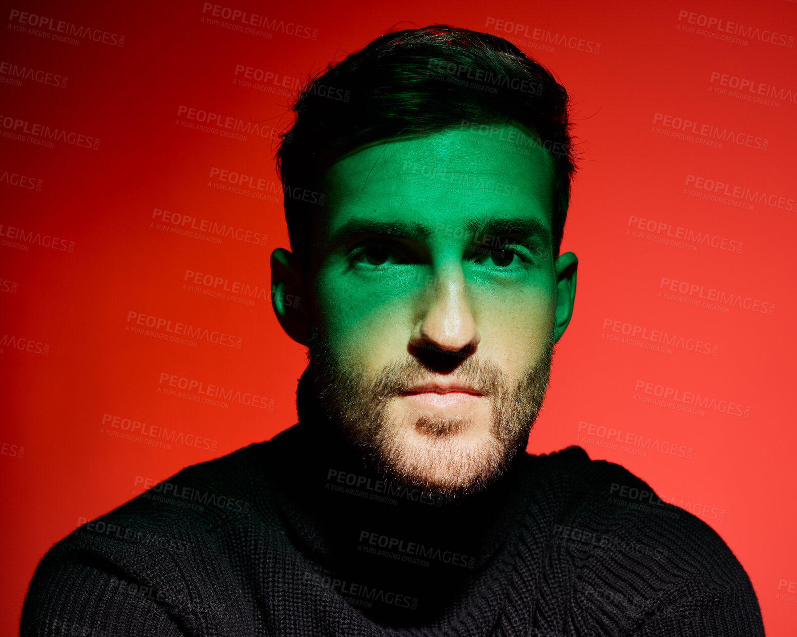 Buy stock photo Fashion, face and trendy man in studio with red background, green light and cool style, elegant and aesthetic. Male model, handsome and attractive portrait, young or edgy with creative or fashionable