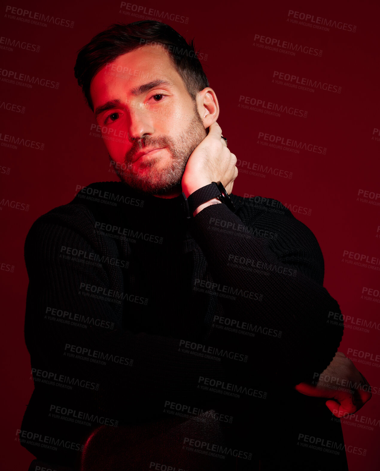 Buy stock photo Fashion, man and neon light for aesthetic model in studio for beauty, success and art portrait on red background. Handsome male in black clothes for professional business style magazine cover