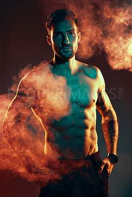 Buy stock photo Fitness, body and man in a studio with smoke or mist after an intense workout or bodybuilding training. Sports, health and portrait of a bodybuilder or athlete with muscle isolated by dark background