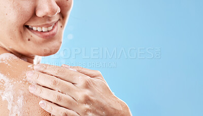 Buy stock photo Skincare, shower and soap with shoulder of woman with mockup for beauty, luxury and spa. Wellness, hygiene and cleaning with girl model and foam for self care, grooming and routine in blue background