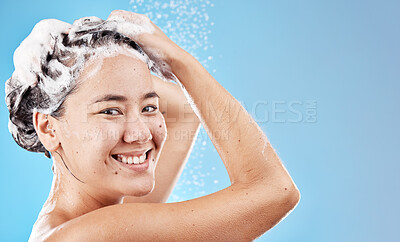 Buy stock photo Water, shampoo and woman in shower on blue background, haircare and hygiene routine in the morning. Model in shower cleaning hair, soap and foam with running water for clean fresh beauty with mockup