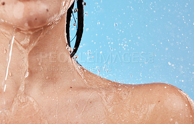 Buy stock photo water, shower and woman shoulder closeup for skincare wellness cleaning or healthy morning routine for beauty. Under water, cosmetics treatment and young person washing in blue background studio