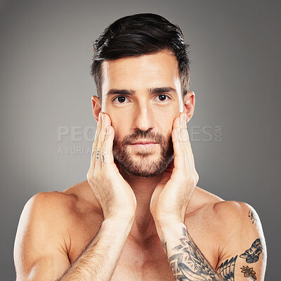 Buy stock photo Skincare, beauty and portrait of a man with face for cosmetics against a grey studio background. Wellness, body and a young cosmetic model with care and health of skin and beard with dermatology