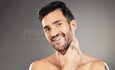 Buy stock photo Wellness, skincare and face of man with smile in studio isolated on gray background. Beauty, cosmetics and confident male model posing for skincare products, body care and grooming for healthy skin