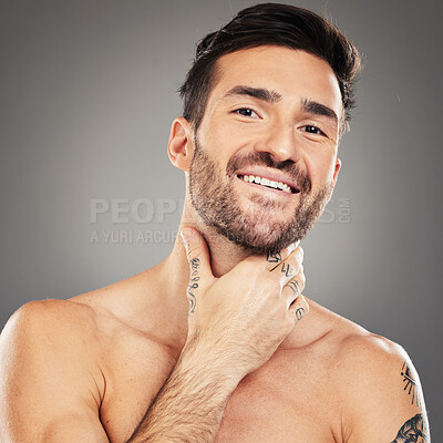 Buy stock photo Skincare, wellness and portrait of man with smile isolated on gray background in studio. Beauty, grooming and face of male model with confidence, happiness and skincare products pose for body care