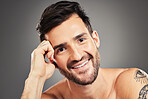 Face, skin and man in skincare and beauty portrait, facial with grooming and natural cosmetics, pose against studio background. Fresh, wellness and isolated in male cosmetic treatment mock up.