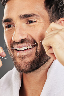 Buy stock photo Man, teeth and face smile for dental floss, skincare or cosmetics for fresh clean or healthy hygiene. Closeup of bearded male flossing toothy mouth for oral, dermatology or gum care treatment