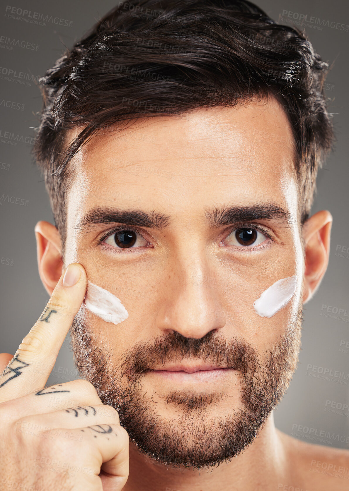 Buy stock photo Portrait of man, skincare and cream product on face for natural skin wellness, cosmetic beauty and skin health in studio. Sunscreen, eye wrinkle protection and organic facial healthcare creme lotion 