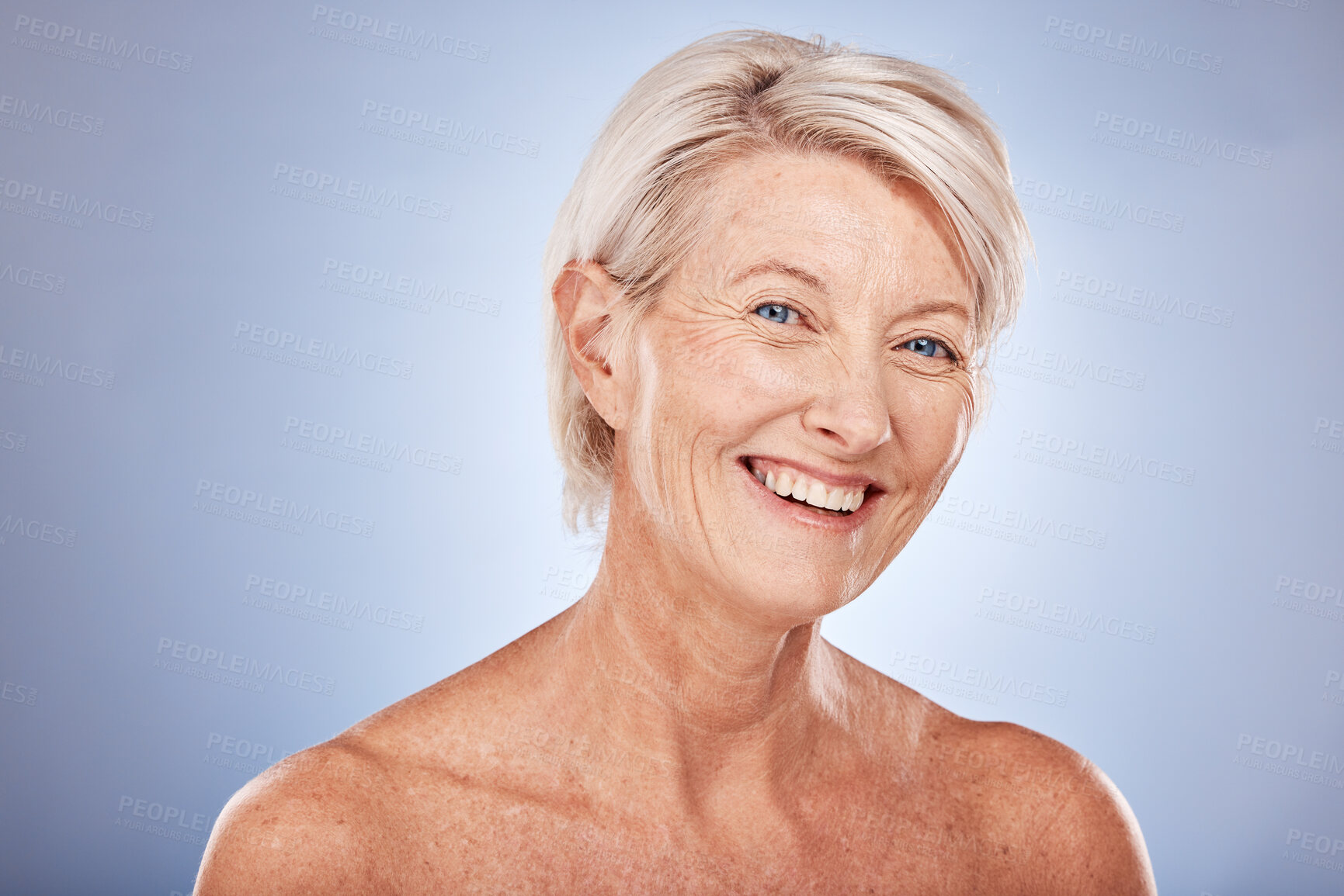 Buy stock photo Portrait, skincare and antiaging with a mature woman in studio on a gray background for natural beauty care. Face, cosmetics and wellness with a senior female posing to promote a skin product