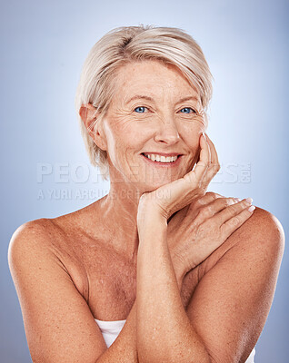 Buy stock photo Beauty, skincare and portrait of mature woman with smile on face on blue background. Health, wellness and retirement, happy senior lady with skin care facial enjoying healthy lifestyle and body care.