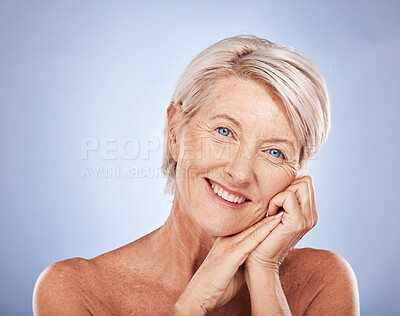 Face portrait, makeup and senior woman in studio isolated on blue background. Skincare, beauty cosmetics or elderly female model from Australia happy for glowing and healthy skin after facial botox