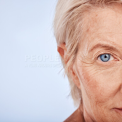 Buy stock photo Portrait, senior woman and face skincare, zoom eye and vision with beauty, makeup or anti aging on mockup studio background. Elderly model, facial cosmetics or mock up space for cosmetic advertising