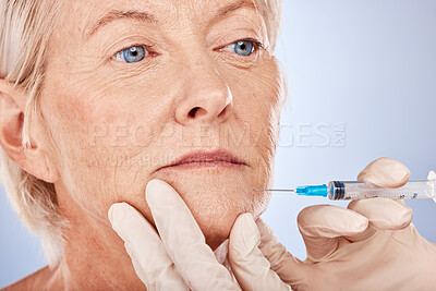 Buy stock photo Plastic surgery, botox and senior woman with needle, skincare injection and wellness on grey studio background. Health, mature lady and elderly female with body care, cosmetics surgery or dermatology