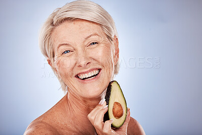 Buy stock photo Senior woman with avocado, natural skincare for plant based product with healthy ingredient. Portrait of happy elderly lady, smile with fruit for face mask and vegan cruelty free lifestyle in studio