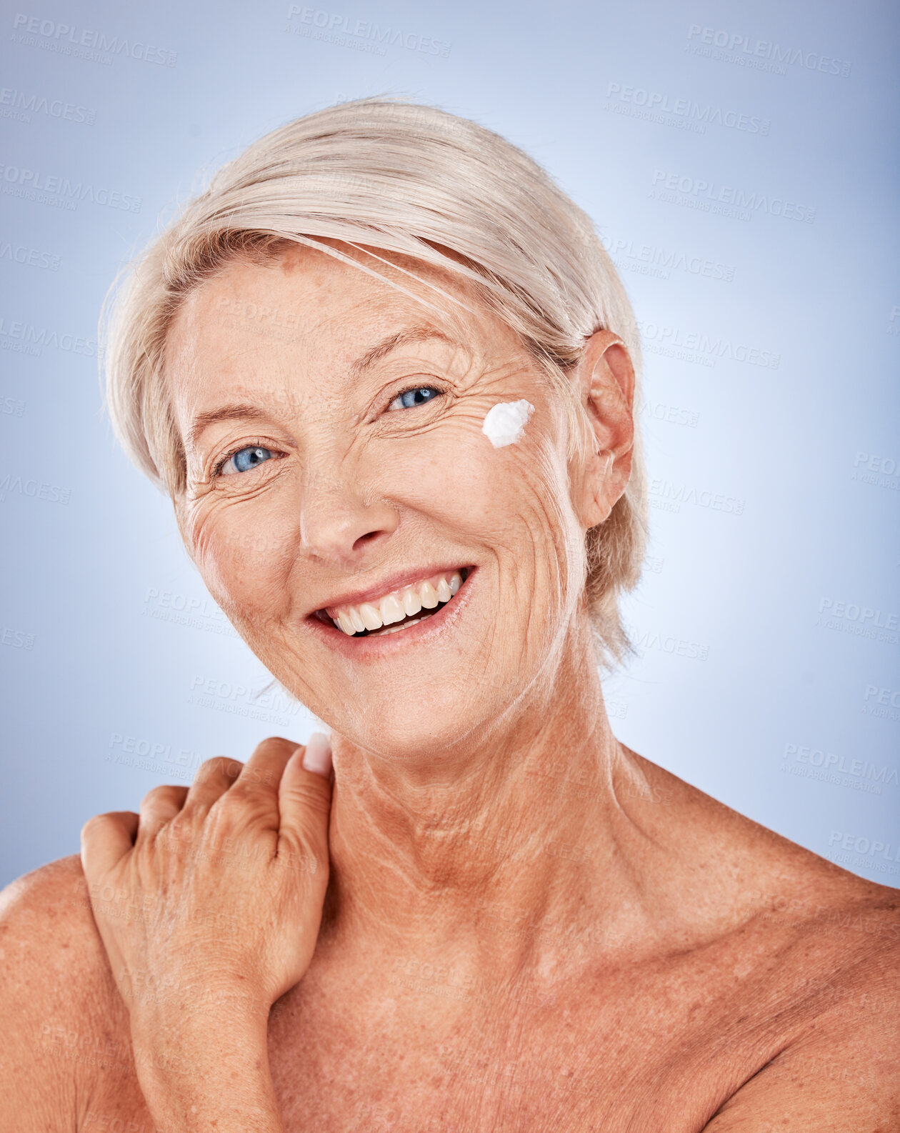 Buy stock photo Cream, skincare and portrait of senior woman in studio for cosmetics, beauty and face wellness promotion, marketing and advertising space. Elderly model facial sunscreen for dermatology or antiaging