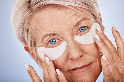 Buy stock photo Skincare, portrait and senior woman with eyepads on face for anti aging facial on studio background. Beauty, cosmetics and mature lady with collagen mask or eye patches for wrinkles and eye wellness.