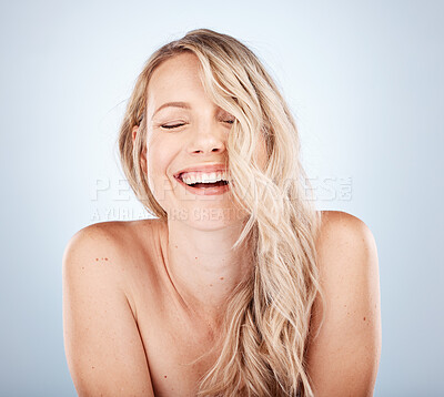 Buy stock photo Beauty, skincare and portrait of woman laughing with blonde hair, happiness and glow on studio background. Health, luxury and wellness, happy beautiful young girl with smile on face and clean skin.