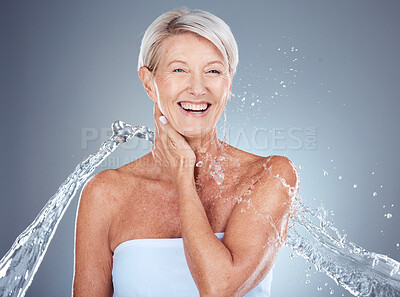 Buy stock photo Mature woman, water and splash for hygiene, shower and cleaning for bodycare and cleansing. Hydration, wash and senior female for beauty, wellness and liquid grooming or skincare and body care