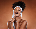 Hair care, beauty and black woman with scarf in studio for wellness, shine and healthy hair. Cosmetics, fashion and portrait of female model with natural afro and curly hair with smile for hair salon