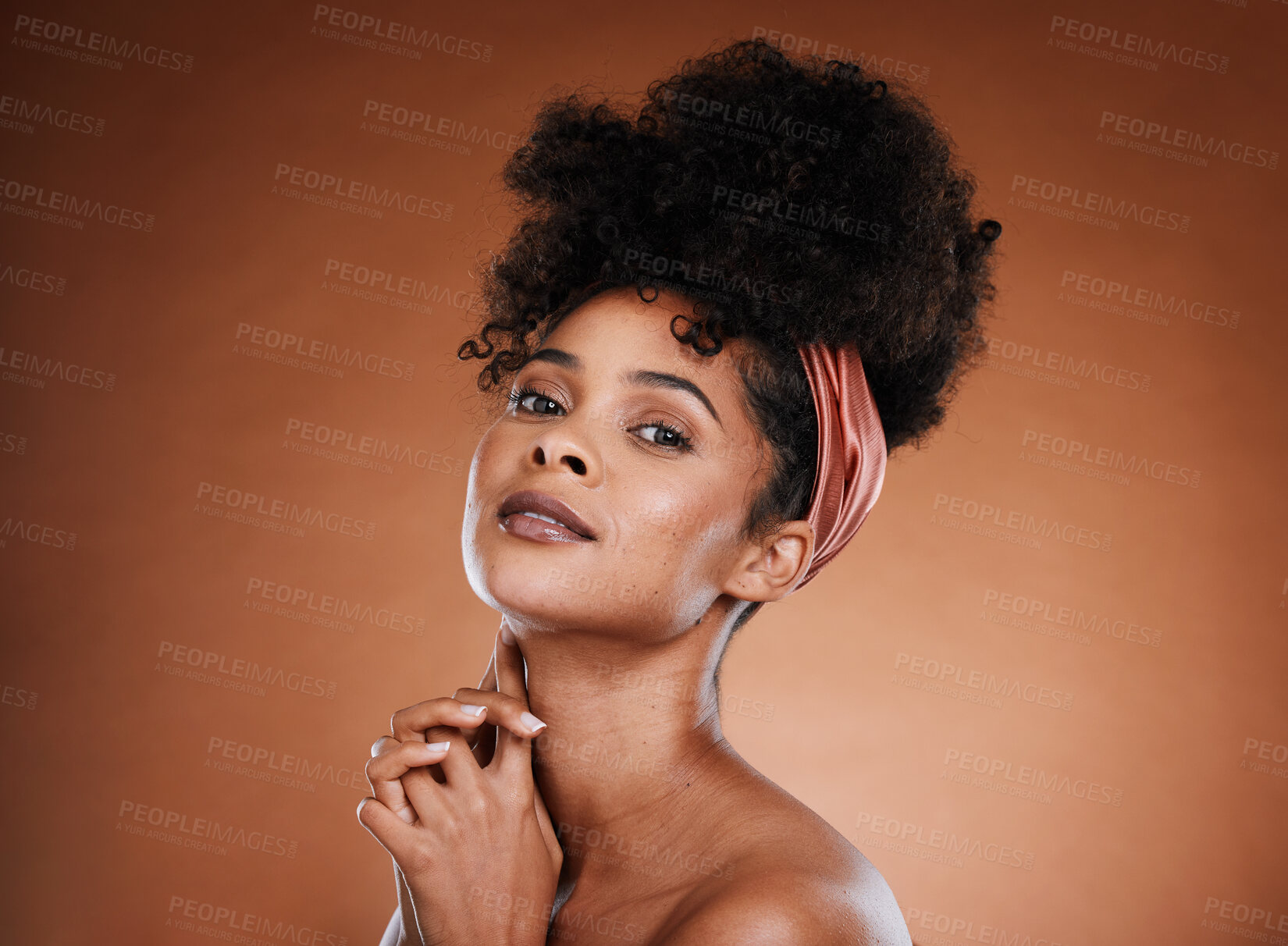 Buy stock photo Beauty, fashion and black woman with nature hair or afro on brown studio background for skincare, self care and hair care. Portrait of African model with smile for cosmetics, make up and dermatology