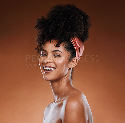 Buy stock photo Hair care, skincare and black woman with a smile for beauty against a brown studio background. Wellness, happy and portrait of an African girl model with makeup, cosmetics and routine grooming