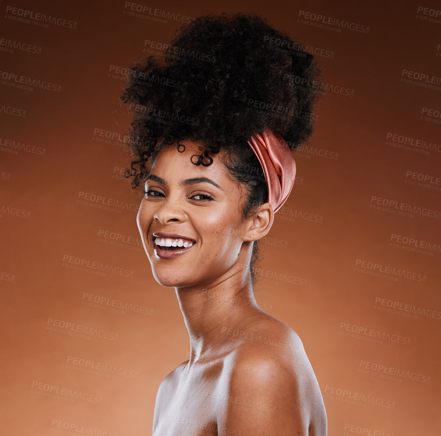Buy stock photo Hair care, skincare and black woman with a smile for beauty against a brown studio background. Wellness, happy and portrait of an African girl model with makeup, cosmetics and routine grooming