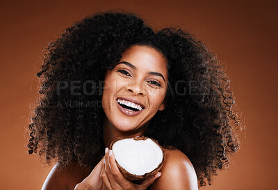 Buy stock photo Black woman, coconut and beauty cosmetics makeup or natural skincare wellness. Luxury skin nutrition, healthy facial  glow and self care, afro and natural or organic hair care health in studio