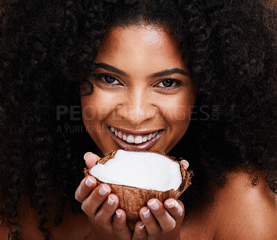 Buy stock photo Beauty, portrait and woman holding coconut for organic skincare, bodycare and glowing skin. African american female, body care and skin care with fruit for natural cosmetology product