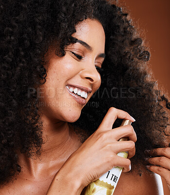 Buy stock photo beauty, afro and black woman with hair care spray for hairstyle maintenance, shine and protection. Spa salon product, wellness and face of model with hairspray bottle for clean healthy hair growth