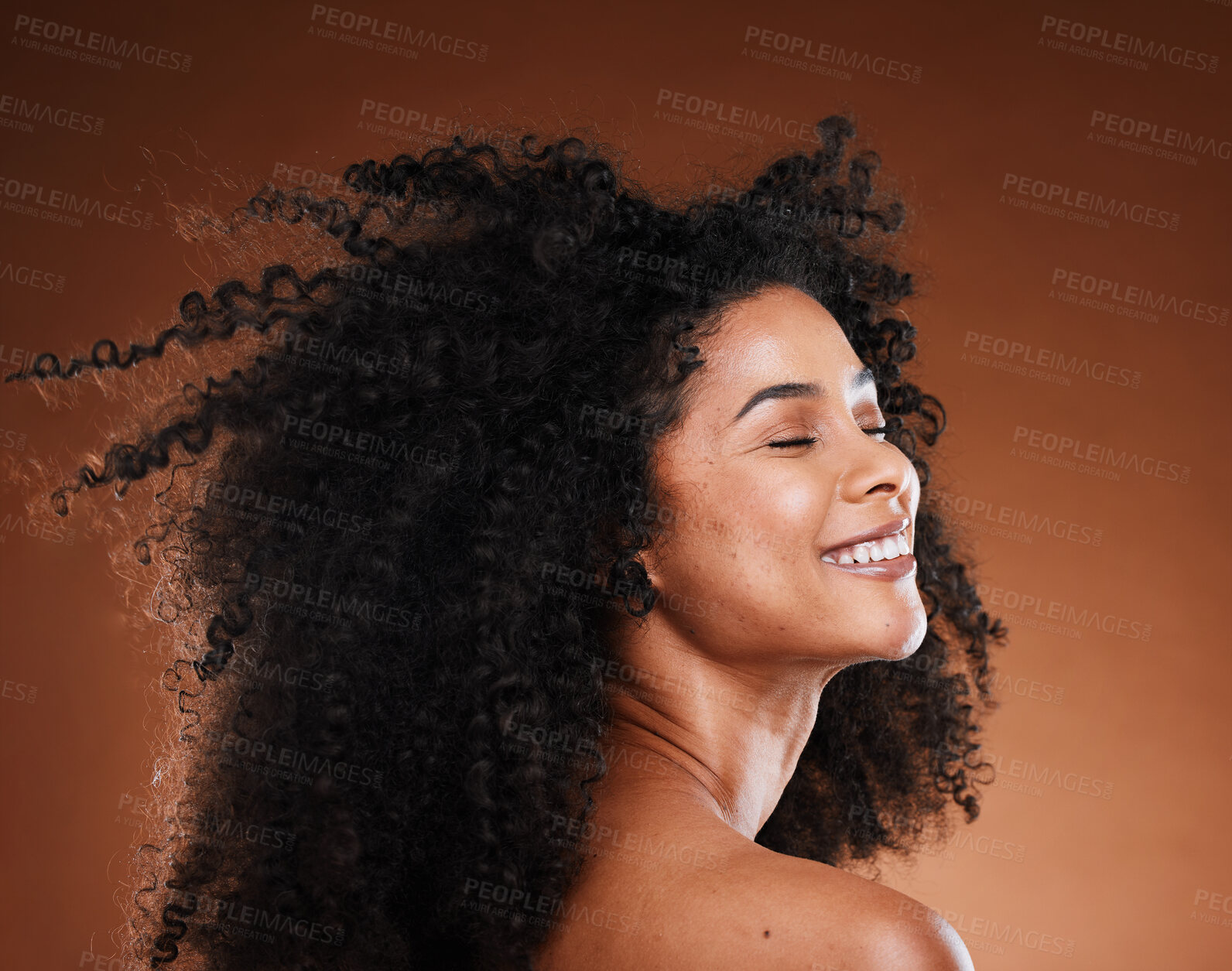 Buy stock photo Hair care, black woman and cosmetics with smile, happy and relax on brown studio background. Makeup, African American female or girl with afro, confidence or organic facial or face detox for skincare