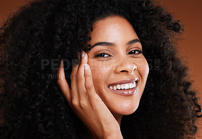 Buy stock photo Hair care, beauty and black woman with natural makeup, cosmetics and skincare in studio for wellness, healthy glow and face promotion. Cosmetic, self love and young model with a facial shine portrait