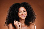 Hair care, natural and black woman in portrait for salon, beauty and wellness with healthy glow in studio. Skincare, hair growth results and happy young model in headshot or face for self love luxury