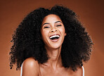Black woman afro, beauty and smile for skincare, makeup or cosmetics against a studio background. Portrait of African American female model smiling in happiness or satisfaction for perfect skin
