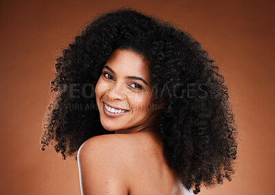 Buy stock photo Curly hair, black woman and natural skincare, portrait and beauty for makeup, confidence or facial cosmetics, aesthetic and wellness on studio background. Happy african model face, afro and happiness