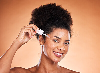 Buy stock photo Black woman, beauty and facial serum, essential oil and aesthetic makeup for glowing skincare on studio background. Portrait african model face, liquid cosmetics and hyaluronic acid, retinol and body