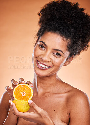 Buy stock photo Black woman, afro hair and orange fruit on studio background for vitamin c skincare, dermatology or blemish treatment. Portrait, smile or happy beauty model with citrus health food for wellness diet