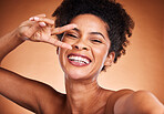 Black woman, smile and selfie in skincare, beauty or cosmetics against a studio background. Portrait of photogenic African American female with peace sign or hand gesture smiling for facial treatment