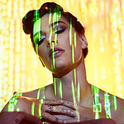 Futuristic, neon and projection on cyberpunk woman thinking with edgy  makeup and hair style in studio. Dystopian, projection and 3d glow  illumination on girl with serious face contemplating future. | Buy Stock
