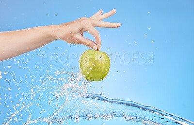 Buy stock photo Apple, water splash and hands of health woman with organic product for healthy lifestyle, antioxidants or fruit detox. Clean natural diet, nutritionist and girl with weight loss food for body care