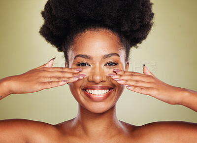 Buy stock photo Black woman afro, face and smile for skincare, cosmetics or makeup against a studio background. Portrait of African American female smiling with teeth in happiness touching facial cosmetic treatment