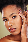 Closeup beauty, portrait and skincare black woman in studio with soft, radiant and glow on skin. African, model and natural makeup on face for cosmetics, wellness and health against green background
