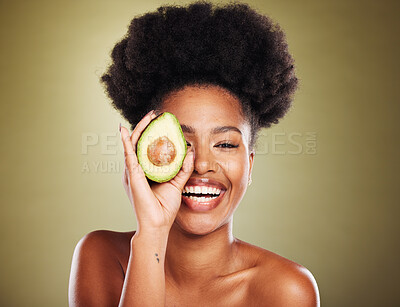Buy stock photo Avocado skincare, black woman and beauty, natural wellness, cosmetics and facial treatment, healthy diet and detox on studio background. Portrait of happy young model, organic food and dermatology 