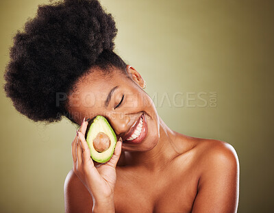 Buy stock photo Avocado, black woman and beauty, skincare and natural cosmetics, nutrition and healthy food for diet, detox and body on studio background. Happy young african model, organic wellness and dermatology

