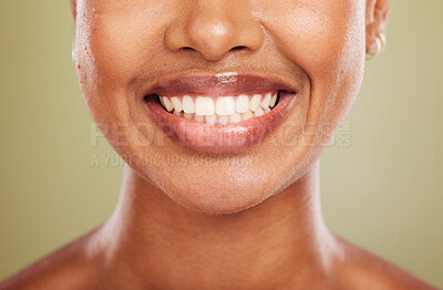 Buy stock photo Smile, teeth and mouth of black woman closeup on studio background for dental care or cosmetics. Health, wellness and happy woman with cleaning routine for oral wellbeing and healthy teeth whitening 